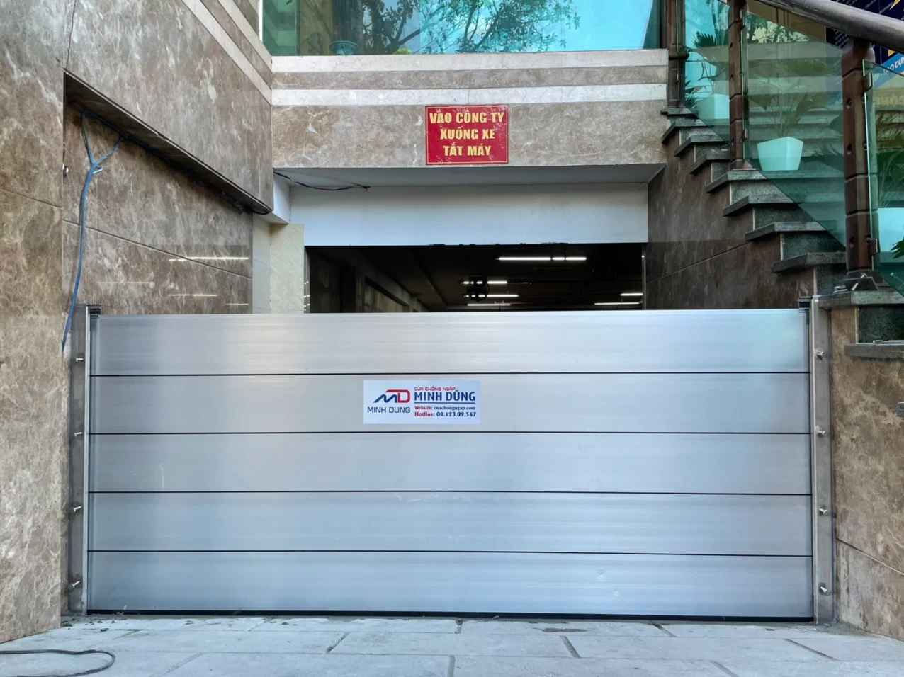 Cửa chống ngập panel nhôm ghép thanh cơ
